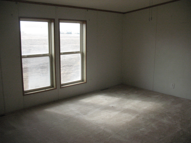 Picture of a bedroom for the home at 889 West Road, Carpenter, WY 82054 - Cheyenne Home for Sale