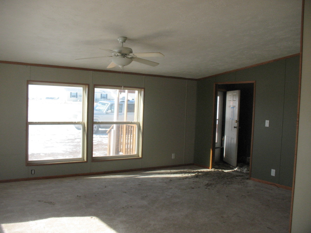 Picture of the living room for the home at 889 West Road, Carpenter, WY 82054 - Cheyenne Home for Sale